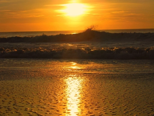 coucher de soleil face océan